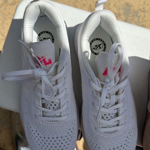 Techloom Pro Sneaker in White & Fusion Pink
APL - Picture 2 of 3